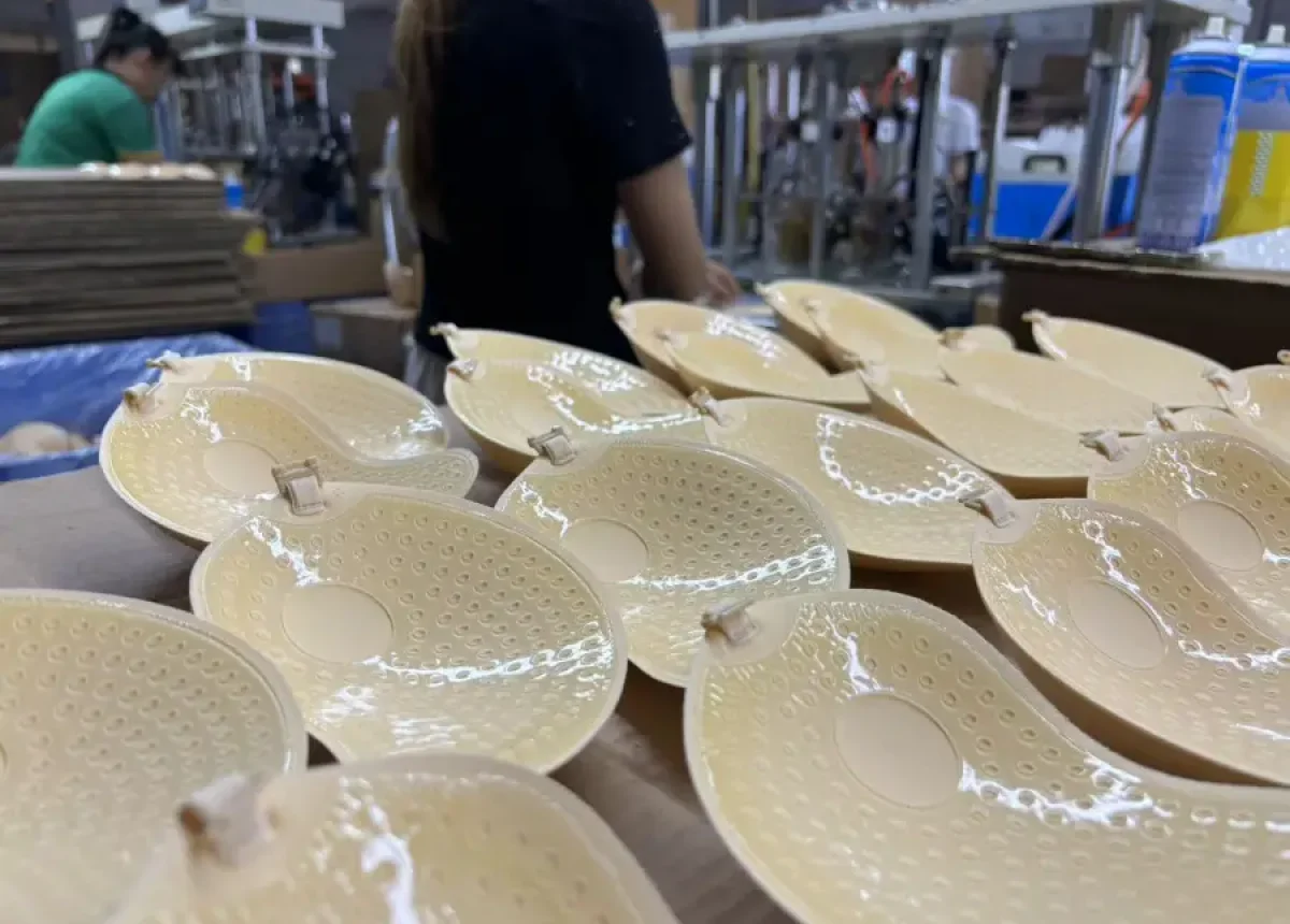 ADHESIVE BRA MANUFACTURER